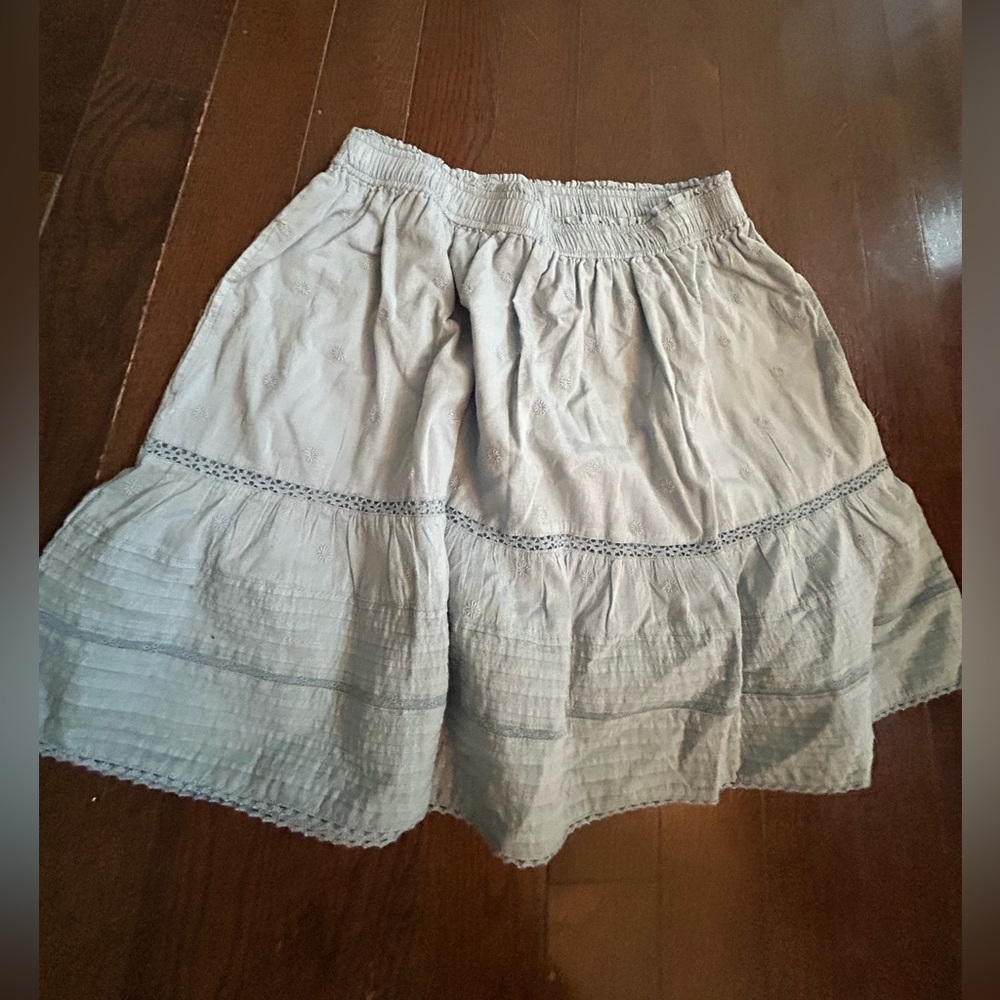 Light blue, mini skirt with pockets and eyelet detail